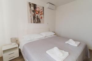 Postel nebo postele na pokoji v ubytování House Villa Petar 1