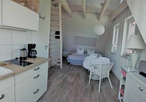 Dapur atau dapur kecil di Ferienzimmer Roth