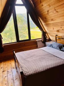 Postel nebo postele na pokoji v ubytování Borjomi Twins + 33 fotografií