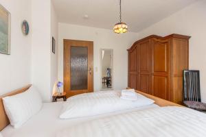 Katil atau katil-katil dalam bilik di Wohnung OG ID 353