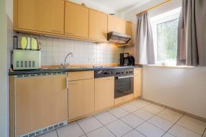 Η κουζίνα ή μικρή κουζίνα στο Wohnung 3B ID 085 +10 φωτογραφίες