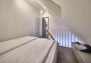 Ένα ή περισσότερα κρεβάτια σε δωμάτιο στο Residenz Steinmarne, FeWo 13 +10 φωτογραφίες