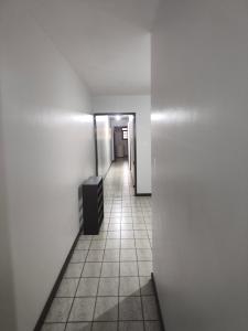 Μια τηλεόραση ή/και κέντρο ψυχαγωγίας στο Hostel São Geraldo