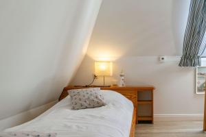 Ένα ή περισσότερα κρεβάτια σε δωμάτιο στο Wohnung 10 Luette Stuuv ID 038 +14 φωτογραφίες