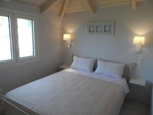 Postel nebo postele na pokoji v ubytování Villa Vanda