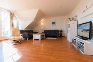 Μια τηλεόραση ή/και κέντρο ψυχαγωγίας στο Wohnung 11 frei salzig ID 365 +13 φωτογραφίες