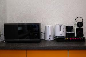 Køkken eller tekøkken på Rehoboth Apart + 20 billeder