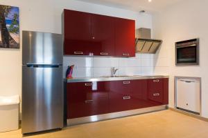 A kitchen or kitchenette at Bubali Luxury Apartments - Adults Only - Wheelchair Friendly