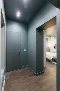 Ένα ή περισσότερα κρεβάτια σε δωμάτιο στο ATLANT luxury apartments Deluxe ТЦ ДЕПОТ та АТБ