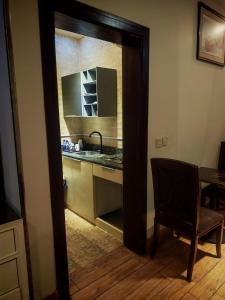 Photo de la galerie de l'établissement قصر العارض للشقق المخدومة, à Al Muzāḩimīyah