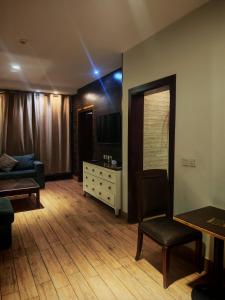 Photo de la galerie de l'établissement قصر العارض للشقق المخدومة, à Al Muzāḩimīyah