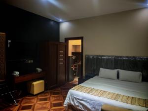 Photo de la galerie de l'établissement قصر العارض للشقق المخدومة, à Al Muzāḩimīyah 17 autres photos