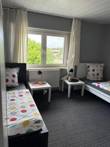 Voodi või voodid majutusasutuse Work and Stay Haus 12 Betten 2 Etagen 2 Badezimmer,Terasse Küche nähe Geleen,Geilenkirchen,Heinsberg,Alsdorf toas