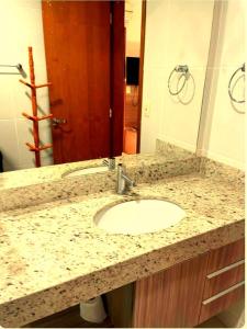 Koupelna v ubytování Caldas Novas - apartamento + 2 fotografie