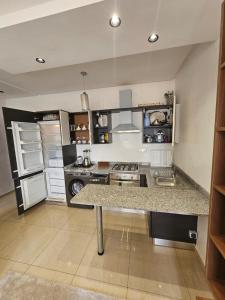 Una cocina o cocineta en laky's chic studio-agadir