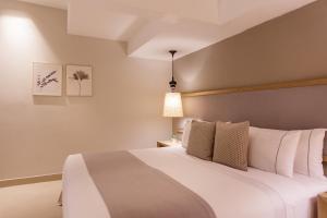 Katil atau katil-katil dalam bilik di Hotel Santa Cecilia B&B