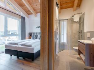 Posteľ alebo postele v izbe v ubytovaní Grebenzen Lodge 1028