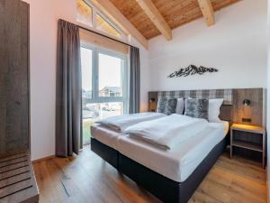 Posteľ alebo postele v izbe v ubytovaní Grebenzen Lodge 1028