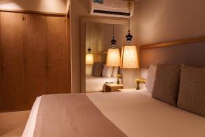 Katil atau katil-katil dalam bilik di Hotel Santa Cecilia B&B