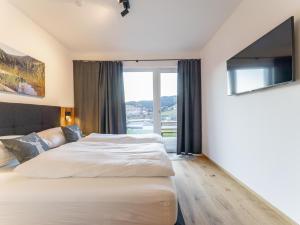 Posteľ alebo postele v izbe v ubytovaní Grebenzen Lodge Hirsch
