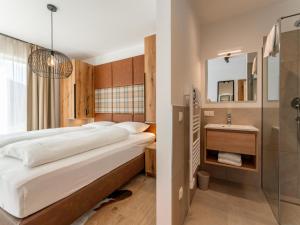 Postel nebo postele na pokoji v ubytování Grebenzen Lodge 51B