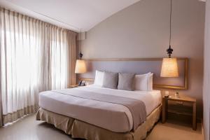 Katil atau katil-katil dalam bilik di Hotel Santa Cecilia B&B