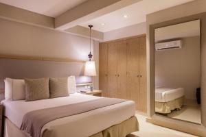 Katil atau katil-katil dalam bilik di Hotel Santa Cecilia B&B