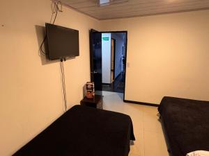Μια τηλεόραση ή/και κέντρο ψυχαγωγίας στο Hotel Bogotá Suites Teusaquillo