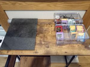 a table with a plastic container on top of it at Marine Guest House in Eastbourne
