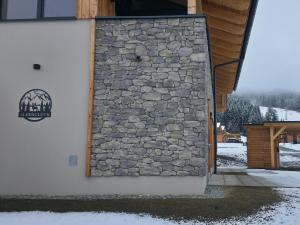 Almchalet Alpenglück v zime