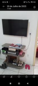 Televisyen dan/atau pusat hiburan di Suite do norte da ilha