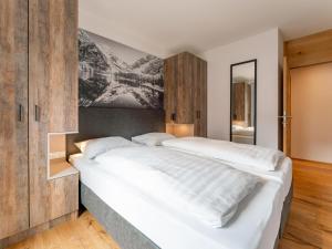 Posteľ alebo postele v izbe v ubytovaní Mountain Chalet Dahoam