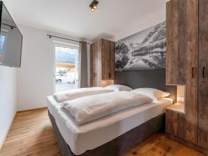 Posteľ alebo postele v izbe v ubytovaní Mountain Chalet Dahoam