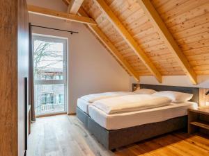 Posteľ alebo postele v izbe v ubytovaní Mountain Chalet Dahoam
