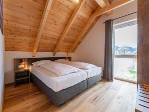 Posteľ alebo postele v izbe v ubytovaní Mountain Chalet Dahoam
