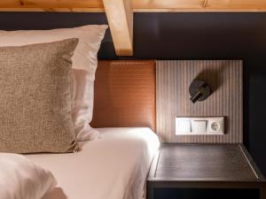 Łóżko lub łóżka w pokoju w obiekcie Mountain Chalet Aquarius 5B