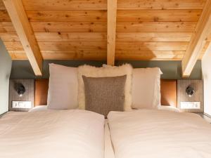 Postel nebo postele na pokoji v ubytování Mountain Chalet Aquarius 5A