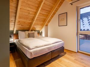 Postel nebo postele na pokoji v ubytování Mountain Chalet Aquarius 5A