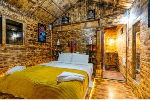 Postel nebo postele na pokoji v ubytování Riad Atlas Bangalow