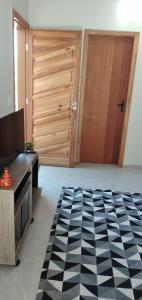 Ένα ή περισσότερα κρεβάτια σε δωμάτιο στο Casa ótima localização com garagem!!!!