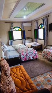 A bed or beds in a room at riad lala fatima
