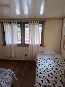 Voodi või voodid majutusasutuse Cabaña con linda vista en Oxapampa toas