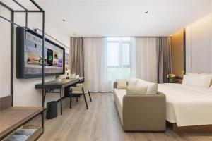 Posezení v ubytování Atour Hotel Dalian Wafangdian + 26 fotografií