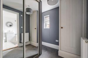 Ένα μπάνιο στο Stylish 2 Bed Apart In The Heart of North Norfolk