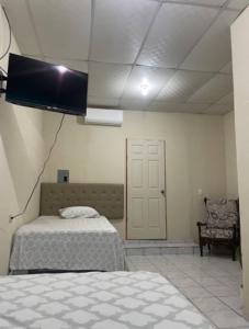 Ένα ή περισσότερα κρεβάτια σε δωμάτιο στο Habitación las brisas