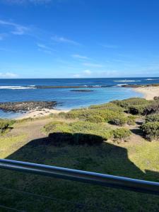 a view of the ocean from a balcony at Wytonia Penthouse Suite in Port Fairy