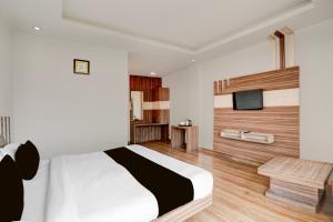 Super Collection O Vaishno Devi Temple Formerly Hotel The Leaf客房内的一张或多张床位