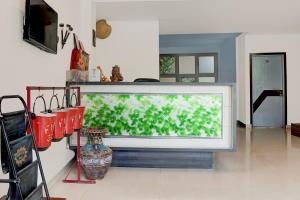 Super Collection O Vaishno Devi Temple Formerly Hotel The Leaf的电视和/或娱乐中心