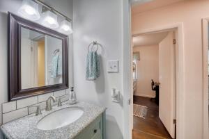 a bathroom with a sink and a mirror at Nature Sounds Retreat in Boone +20 photos