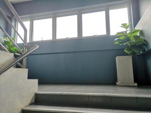 Fotografie z fotogalerie ubytování Capital O 75406 Hotel M Rojana v destinaci Ayutthaya